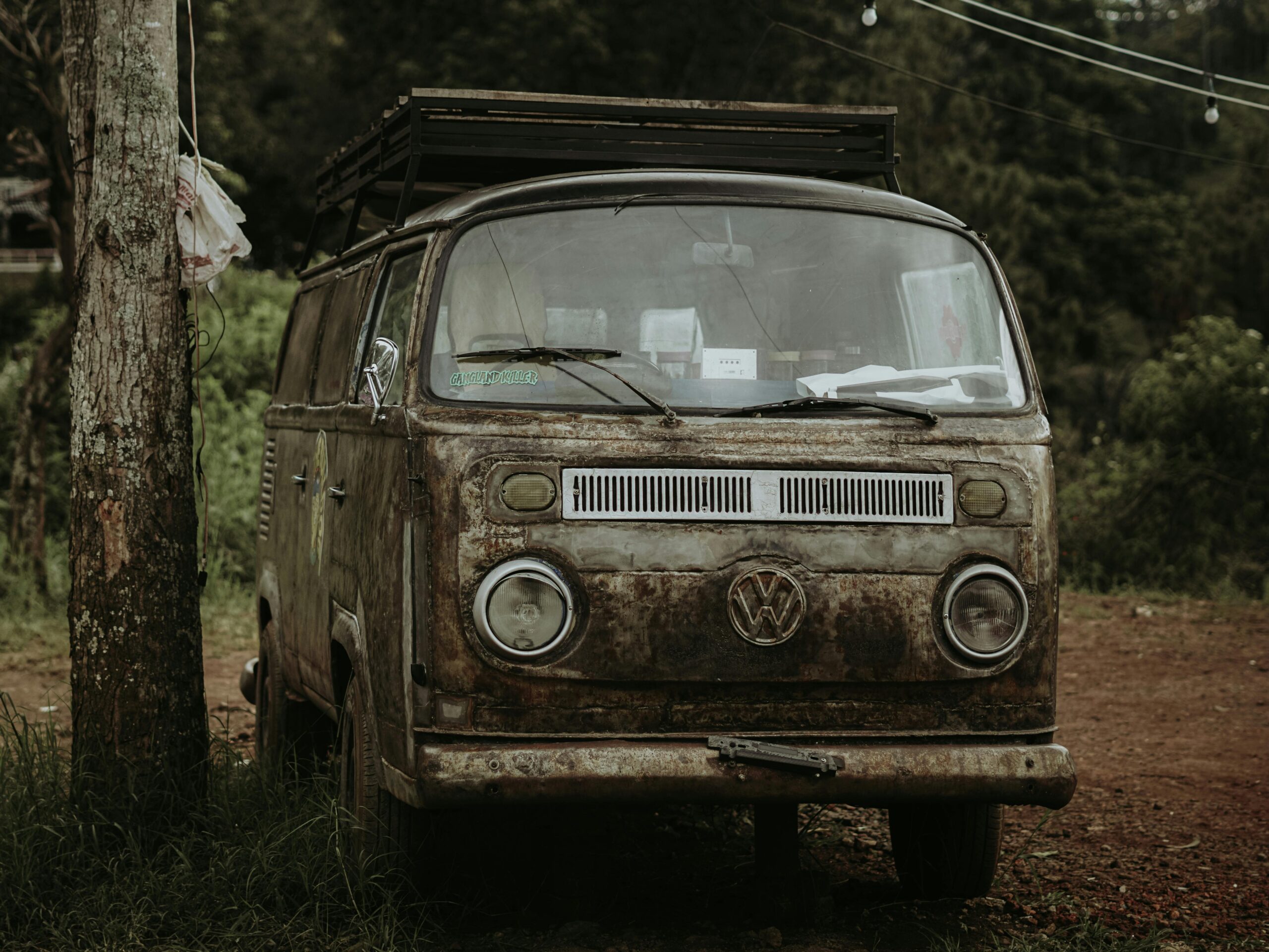 Front view of a classic vintage Volkswagen van parked outdoors, showcasing its nostalgic design.
